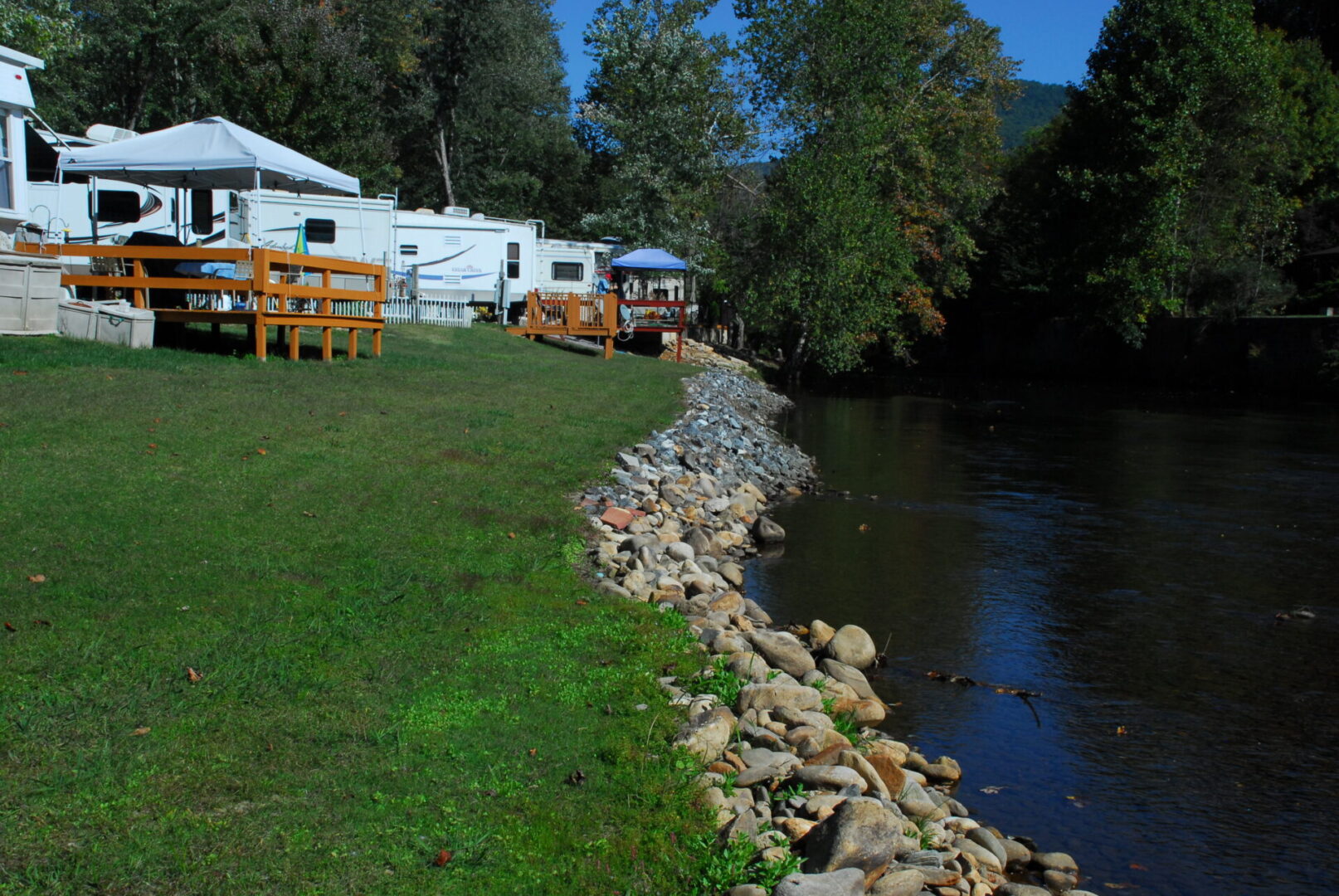 A trailer park on a riverbank